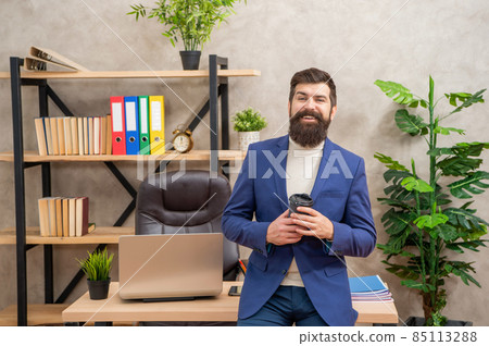 Happy manager hold takeaway cup working in office, break Happy manager hold takeaway cup working in office, break 85113288