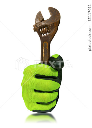 Gloved Hand Holding an Old Rusty Adjustable Wrench Isolated on White Gloved Hand Holding an Old Rusty Adjustable Wrench Isolated on White 85117011