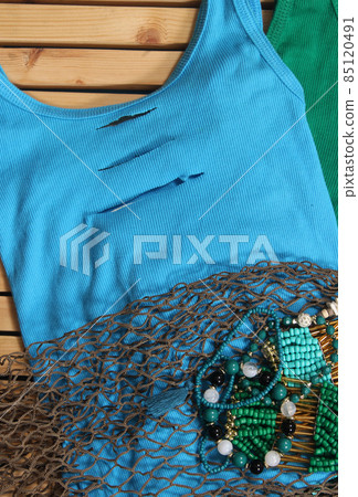 Mermaid Fashion With Jewelry And Fishing Net Stock Photo, Picture and  Royalty Free Image. Image 175889955.