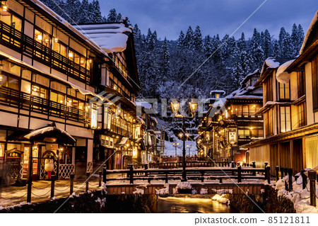Scenery of Ginzan Onsen Obanazawa City, Yamagata Prefecture, on a winter night with snow Scenery of Ginzan Onsen Obanazawa City, Yamagata Prefecture, on a winter night with snow 85121811