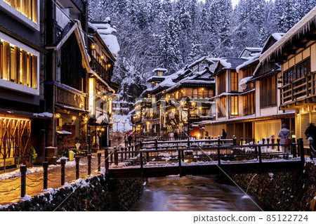 Scenery of Ginzan Onsen Obanazawa City, Yamagata Prefecture, on a winter night with snow 85122724