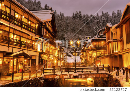 Scenery of Ginzan Onsen Obanazawa City, Yamagata Prefecture, on a winter night with snow 85122727
