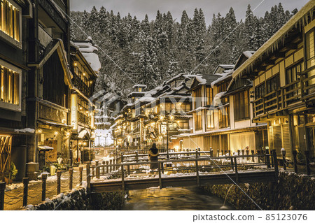 Scenery of Ginzan Onsen Obanazawa City, Yamagata Prefecture, on a winter night with snow 85123076
