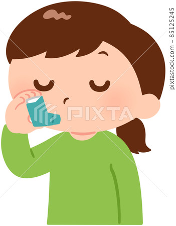 A girl using an inhaler A girl using an inhaler 85125245