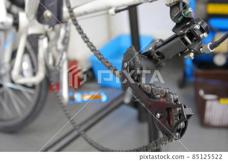 Rear derailleur removed by replacing the rear tire of a small bicycle Rear derailleur removed by replacing the rear tire of a small bicycle 85125522