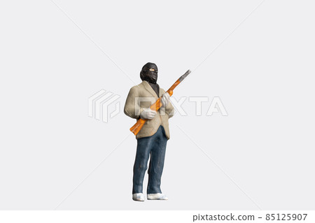 Miniature people criminal man holding gun on white with clipping path 85125907