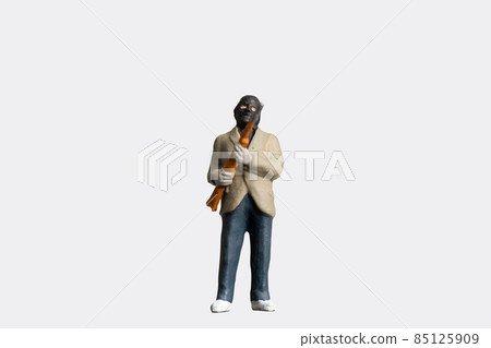 Miniature people criminal man holding gun on white with clipping path 85125909