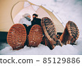 close up male and female winter shoes. 85129886