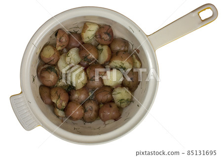 freshly cooked young red potatos in a pot 85131695