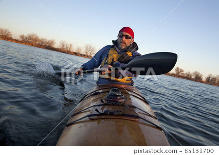 paddling workout in a sea kayak 85131700