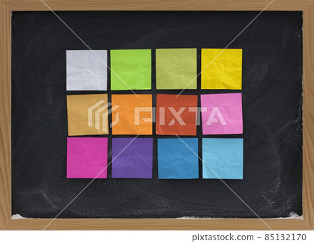 colorful sticky notes on blackboard 85132170