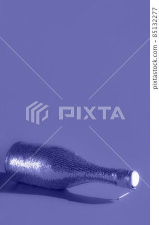 Modern design template with champaigne bottle covered in sequines toned in trendy color of year 2022. Holiday celebration concept. Modern template for your design. Modern design template with champaigne bottle covered in sequines toned in trendy color of year 2022. Holiday celebration concept. Modern template for your design. 85132277