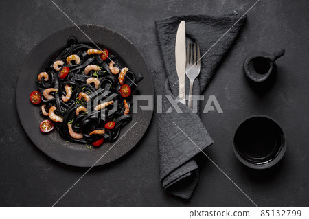 delicious top view black shrimp pasta soy sauce. High quality photo 85132799