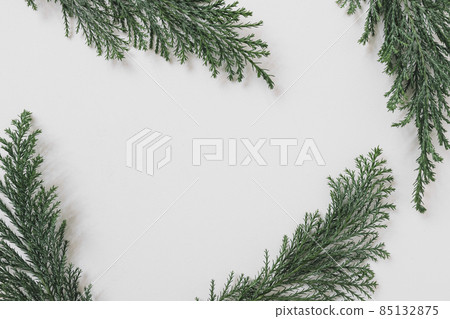 green branches white table. High quality photo green branches white table. High quality photo 85132875