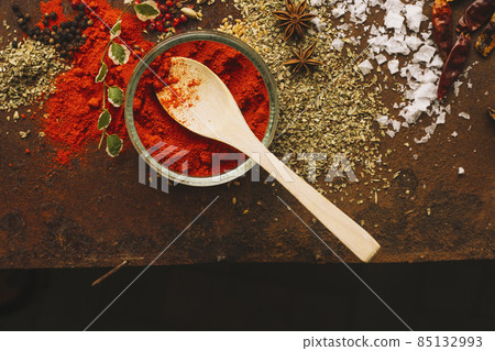 bowl spoon paprika near spices. High quality photo 85132993