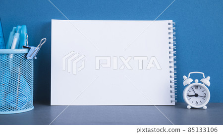 spiral notepad stationery round alarm clock. High quality photo spiral notepad stationery round alarm clock. High quality photo 85133106