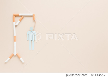 top view hanging man made by cigarettes. High quality photo 85133557