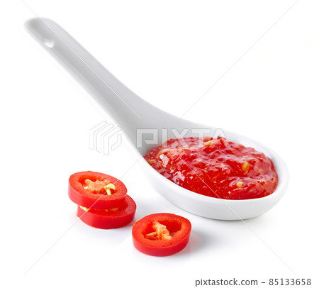 spoon of hot chili sauce 85133658