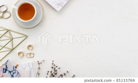 desktop with tea cup. High quality photo desktop with tea cup. High quality photo 85133769