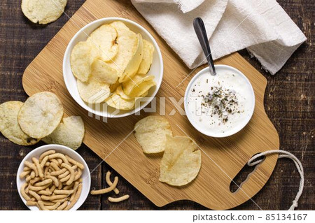 top view potato chips with sauce. High quality photo 85134167