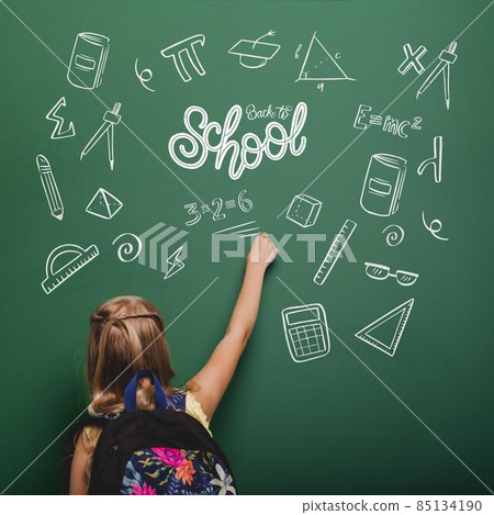 medium shot girl writing green board. High quality photo medium shot girl writing green board. High quality photo 85134190