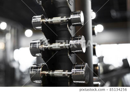 arrangement dumbbells gym. High quality photo arrangement dumbbells gym. High quality photo 85134256