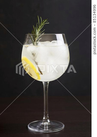 aromatic cocktail glass rosemary. High quality photo aromatic cocktail glass rosemary. High quality photo 85134996