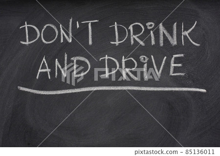 do not drink and drive warning  on a blackboard 85136011