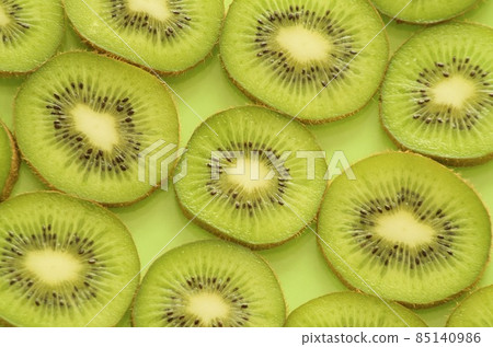 Lots of kiwifruit slices Lots of kiwifruit slices 85140986