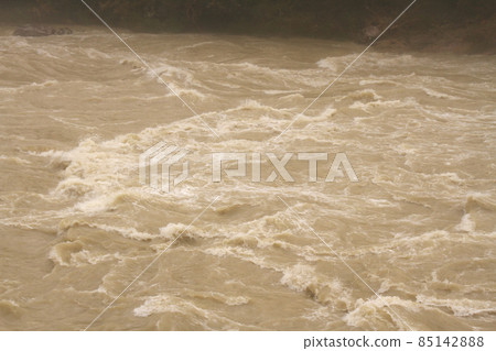 Muddy stream of the Hida River 85142888