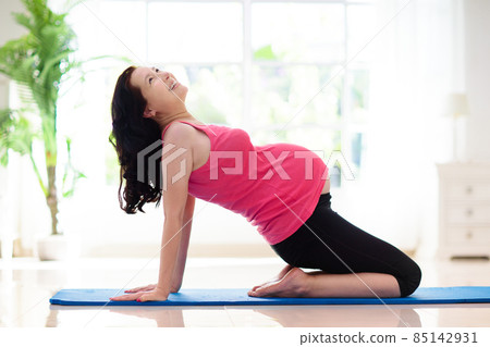 Pregnancy yoga. Exercise for pregnant woman. 85142931