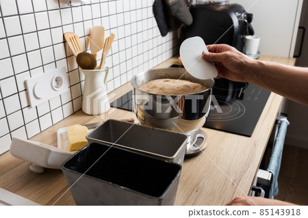 The process of making rye bread. Dough on rye bread before dividing. Front view. 85143918