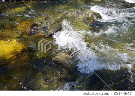 Clear stream, river flow, splash, stream in the mountains of Japan, Hisata River, rocky area Clear stream, river flow, splash, stream in the mountains of Japan, Hisata River, rocky area 85144647