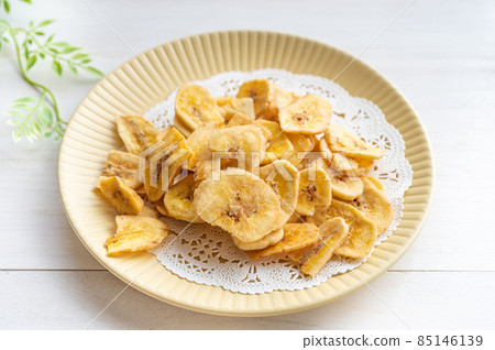 Banana chips on a plate Banana chips on a plate 85146139