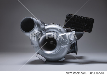 New metal turbocharger. Exhaust gas blower. Parts background 85146581