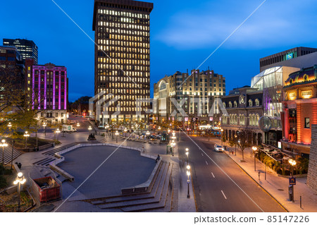 Quebec, Canada - October 18 2021 : Night view of the Quebec City Old Town street in autumn. Place D'Youville. Quebec, Canada - October 18 2021 : Night view of the Quebec City Old Town street in autumn. Place D'Youville. 85147226