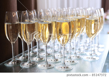 Champagne glasses on the table. Buffet table. A party or celebration. The concept of the holiday.Buffet at a social party. 85147372
