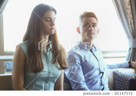 Female and male sitting in cafe on business meeting, business partners or colleagues 85147572