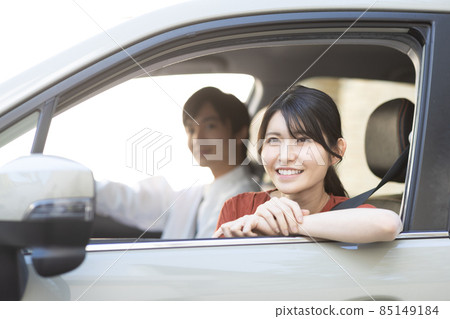 Cute lady driving a car 85149184