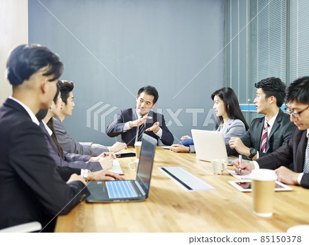 team of asian corporate business people men and women meeting in office 85150378