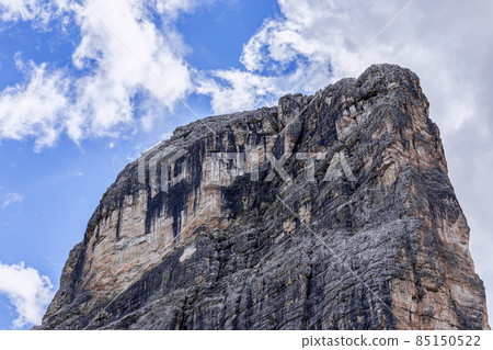 Mountain top Dolomite cliffs in the Italian Alps with characteristic structure and color Mountain top Dolomite cliffs in the Italian Alps with characteristic structure and color 85150522