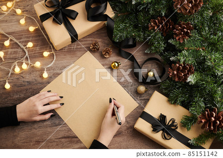 Woman Writing Christmas Letter 85151142