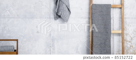 Organic waffle linen towels, bamboo toothbrushes, bathroom zero waste accessories in grey shades in contemporary bathroom interior. Daily body care, spa and wellness zero waste bathroom concept 85152722