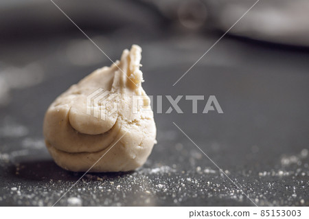 Dough for Mexican corn tortillas for tacos, quesadilla, fajitos, tortilla on grey table top Dough for Mexican corn tortillas for tacos, quesadilla, fajitos, tortilla on grey table top 85153003