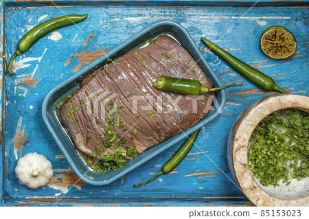 Process of cooking tacos with grilled flank beef steak with handmade guacomole Process of cooking tacos with grilled flank beef steak with handmade guacomole 85153023