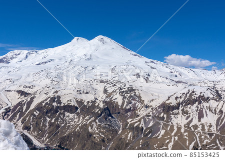 view of the snowy summit of Elbrus view of the snowy summit of Elbrus 85153425