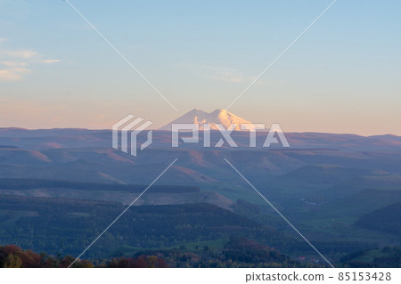 view of Mount Elbrus on a spring evening view of Mount Elbrus on a spring evening 85153428