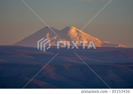 view of Mount Elbrus on a spring evening view of Mount Elbrus on a spring evening 85153430