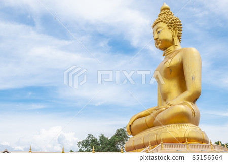 Golden Buddha in Chiang Saen style in Phutthamonthon (Buddhist park) build to celebrate its 750th anniversary of Chiang Rai ancient city.  85156564