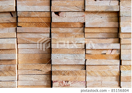 Industrial heads wood rectangle shape of sawed timber material that are stacked in a square on wood warehouse store, wood texture and background 85156804